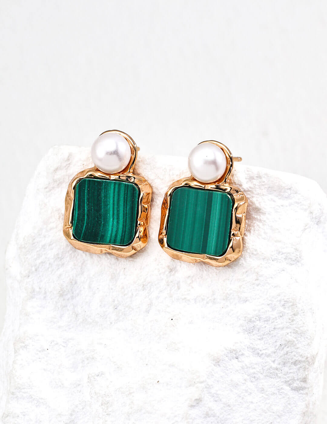 Close-up of the 2cm drop earrings showing the 6mm pearl and malachite stone details.