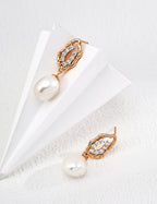 Close-up of irregular natural pearls and zircon stones