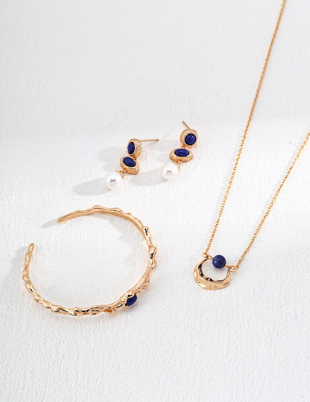 Premium S925 sterling silver with warm vintage gold finish, showcasing exquisite craftsmanship in celestial earrings.