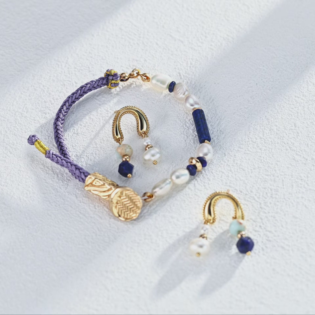 elegant bohemian drop earrings shown for scale, creating a striking yet wearable statement.
