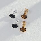 Elegant presentation of both Black Onyx and Tiger's Eye earrings sets, showcasing sophisticated gemstone jewelry options.