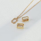 Collection of model shots showing the necklace from different wearing angles.