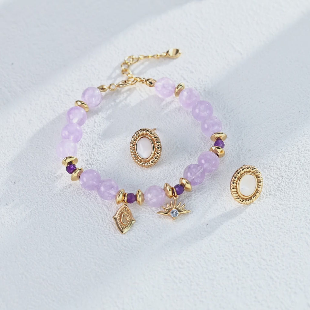 The shell stud earrings elegantly displayed inside an open gift box.