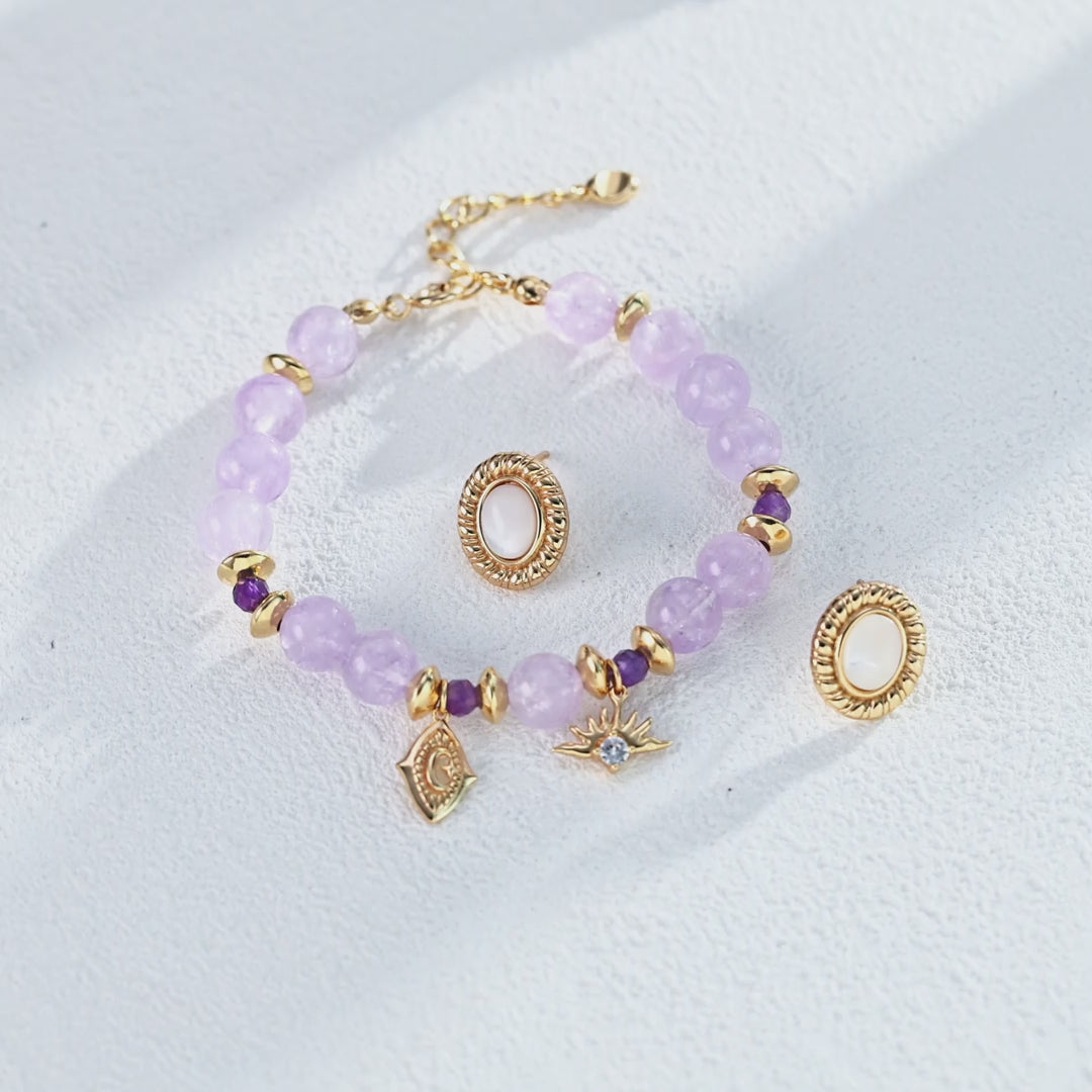 The shell stud earrings elegantly displayed inside an open gift box.