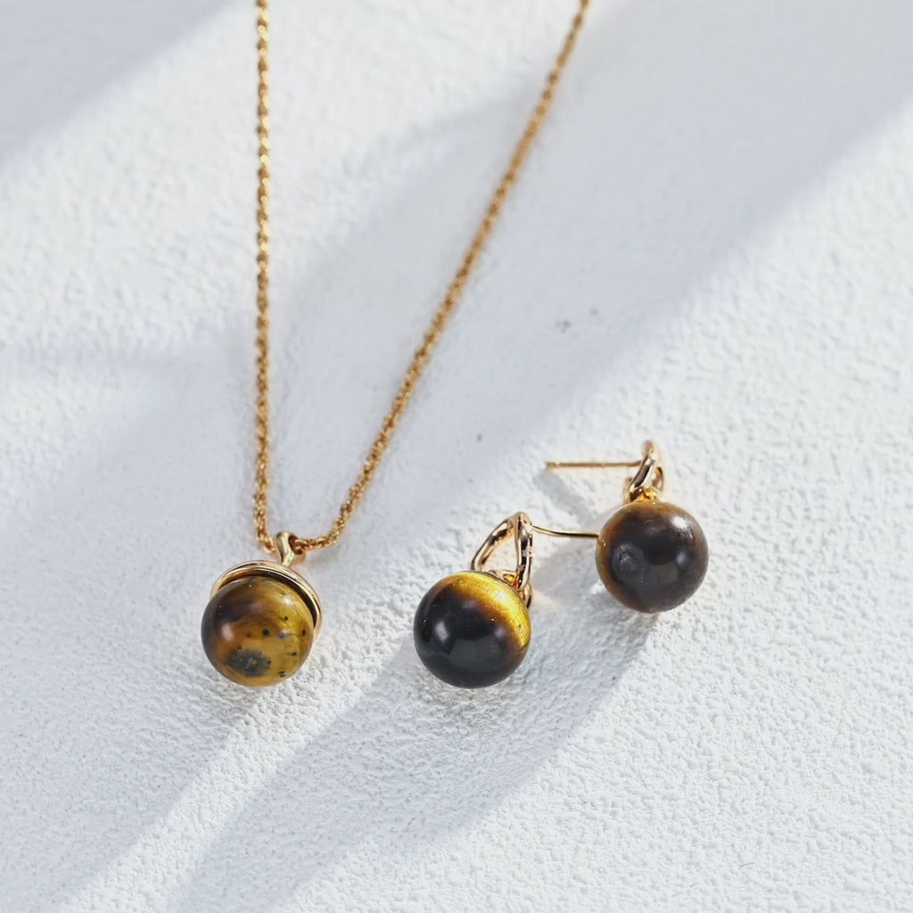 Earrings elegantly displayed inside open gift box ready for gifting.