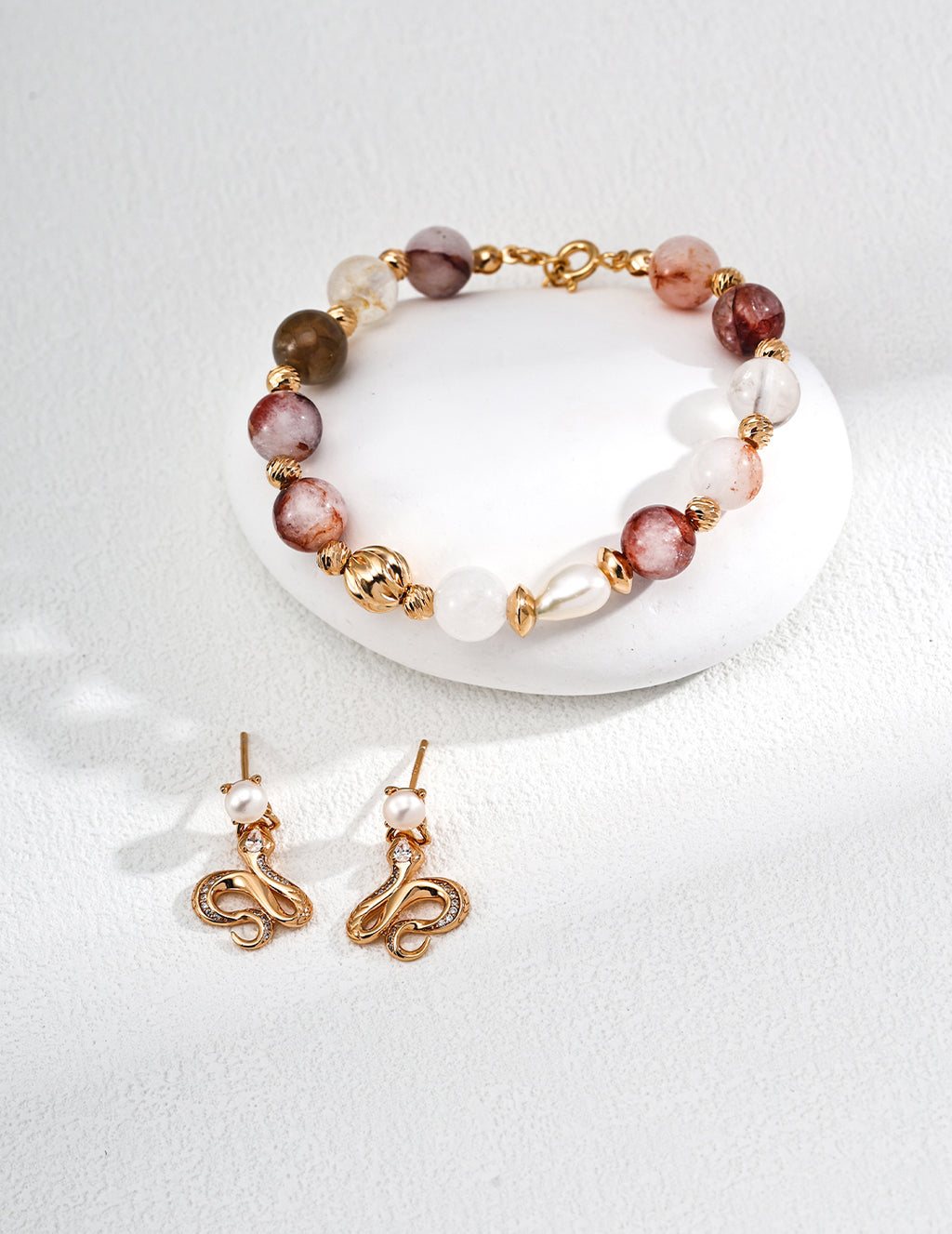 Close-up of the 8mm red agate crystal bead showing its warm, captivating luster and natural inclusions.