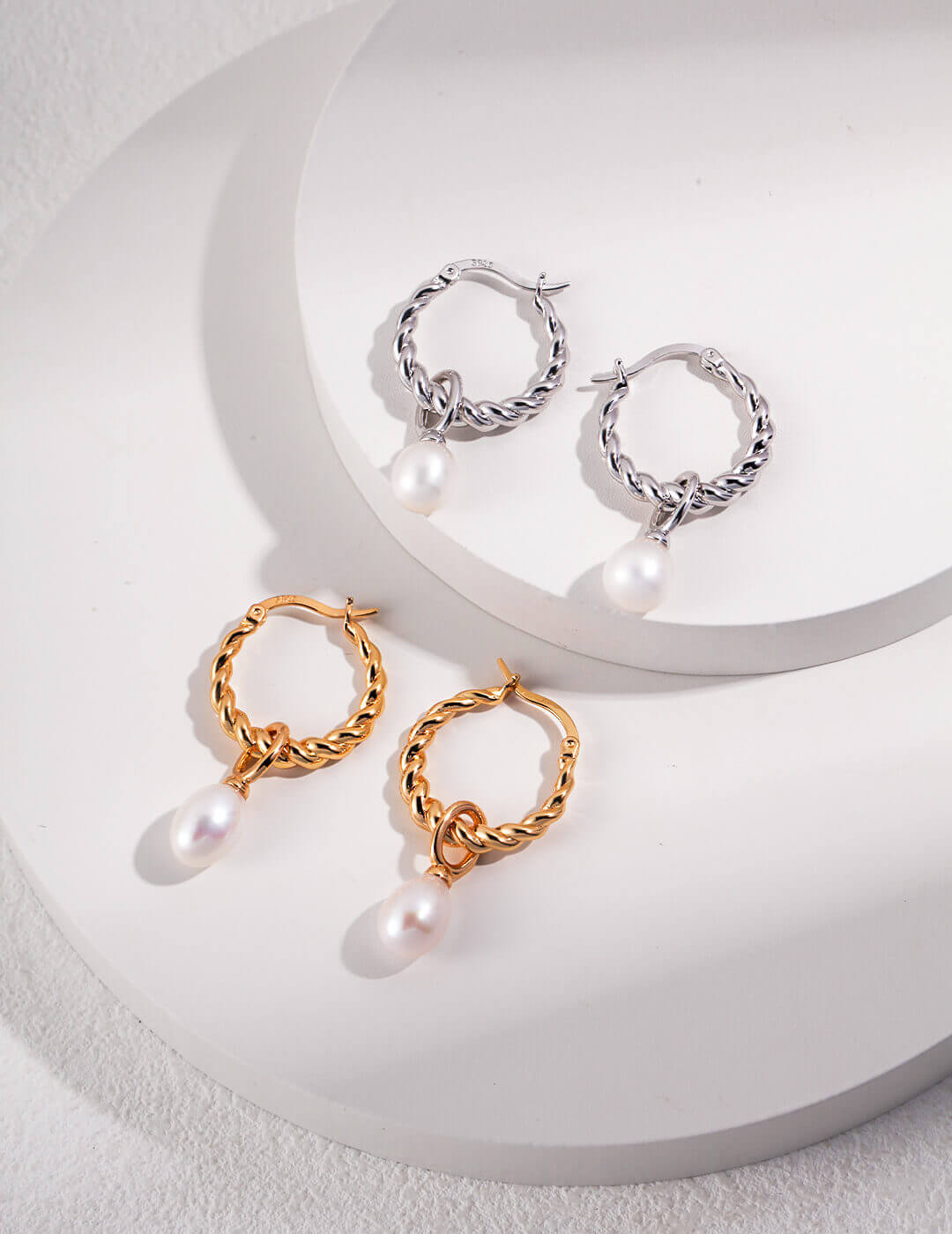 Front view of elegant natural pearl drop earrings in S925 sterling silver.
