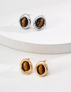Front view of minimalist natural Tiger's Eye stud earrings in S925 sterling silver.