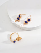 Secure and comfortable sterling silver ear hook design for natural pearl and lapis lazuli drop earrings.