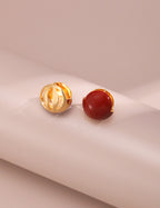 Secure earring back and comfortable post for red enamel drop earrings, ensuring easy and safe wear.