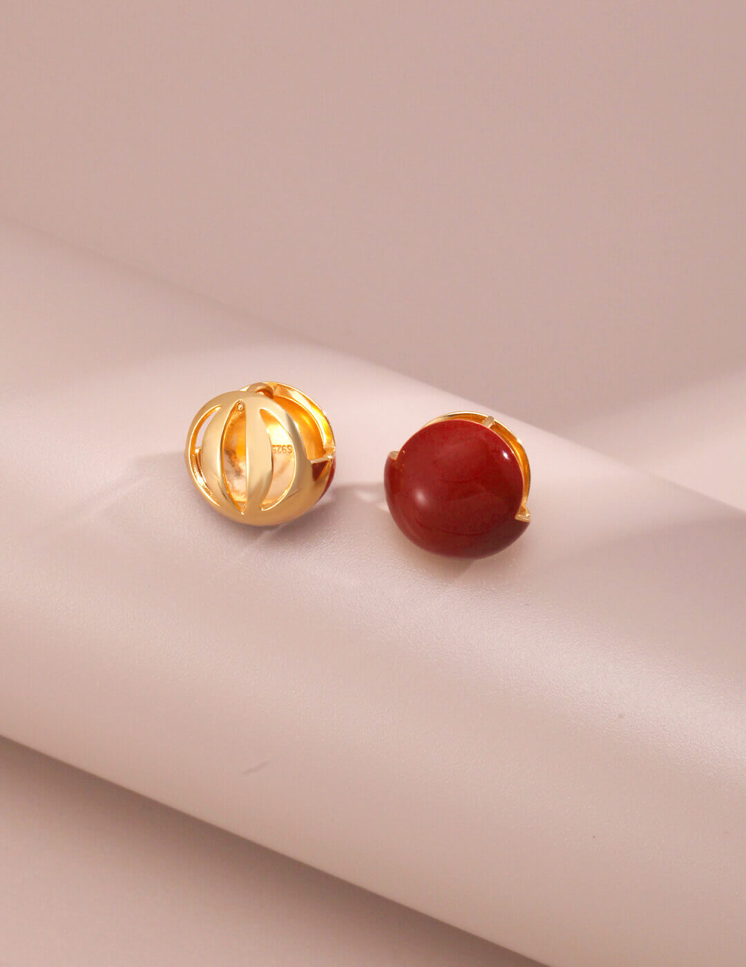 Secure earring back and comfortable post for red enamel drop earrings, ensuring easy and safe wear.