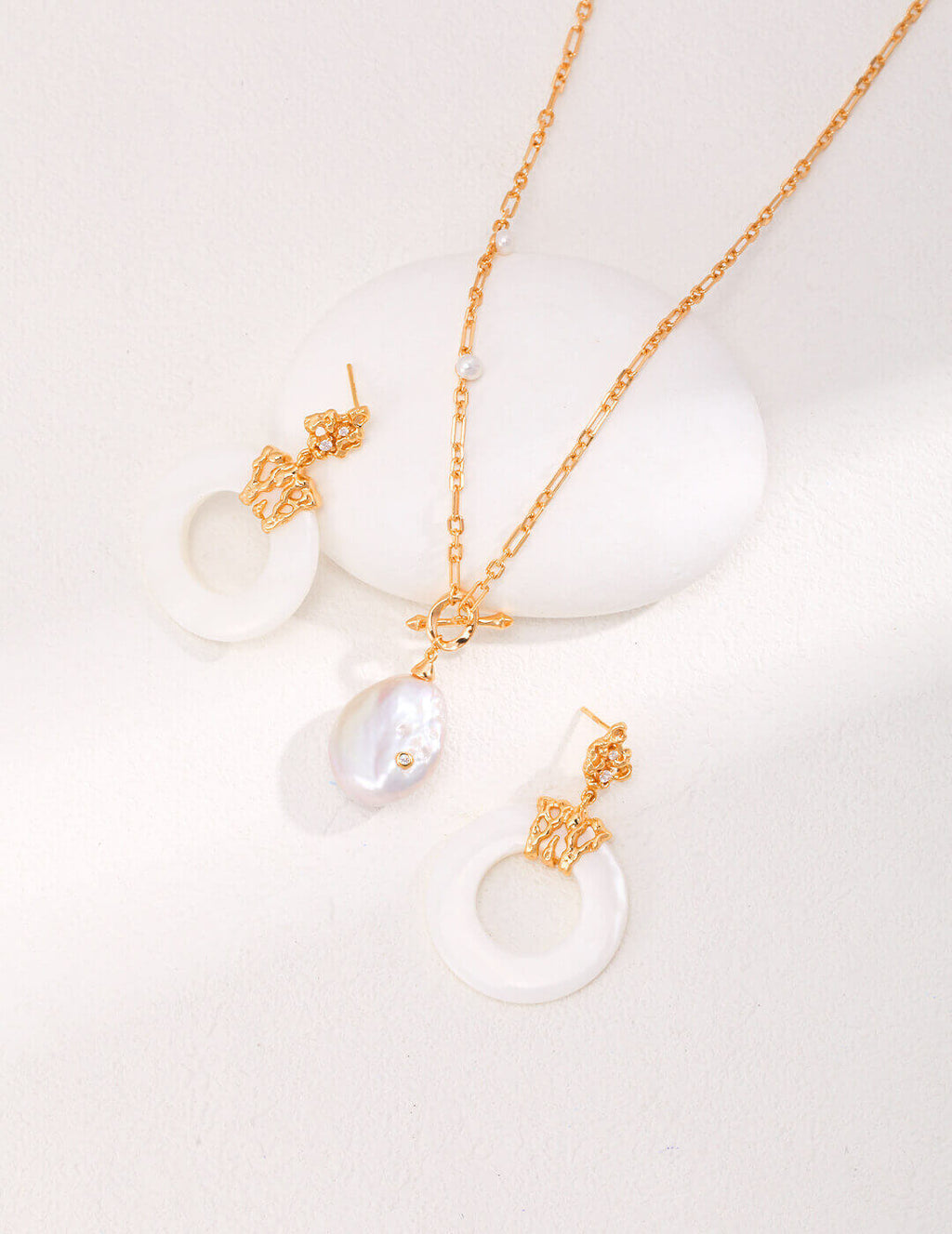 Secure and comfortable post back for the minimalist hollow-out shell earrings, ensuring easy all-day wear.