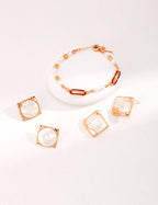 Secure post back and comfortable design of mosaic shell earrings for all-day wear.