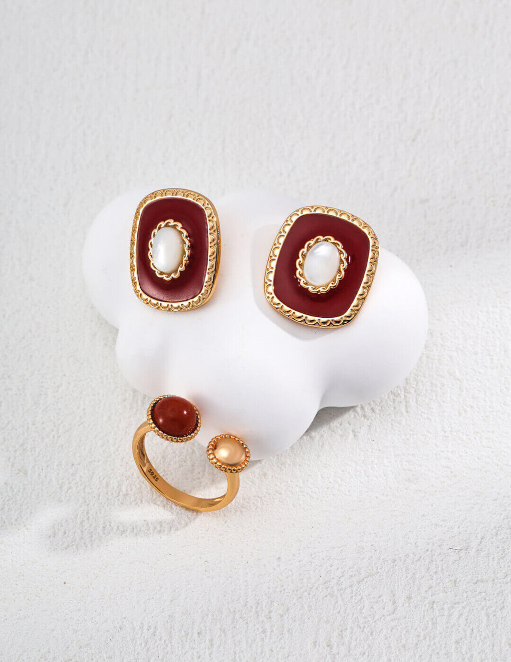 Detail of the hypoallergenic 925 sterling silver ear post and secure clasp.