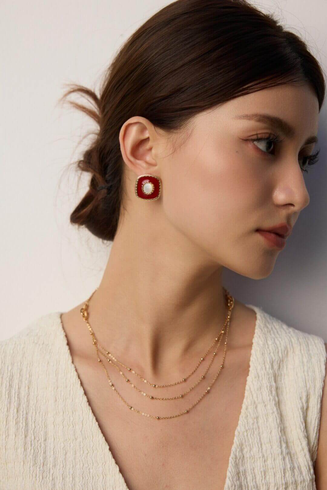 Detail of the hypoallergenic 925 sterling silver ear post and secure clasp.