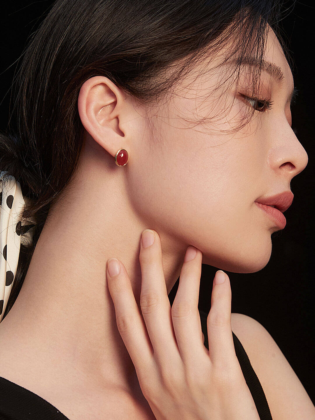 Model with hair up clearly displaying the small, elegant studs.
