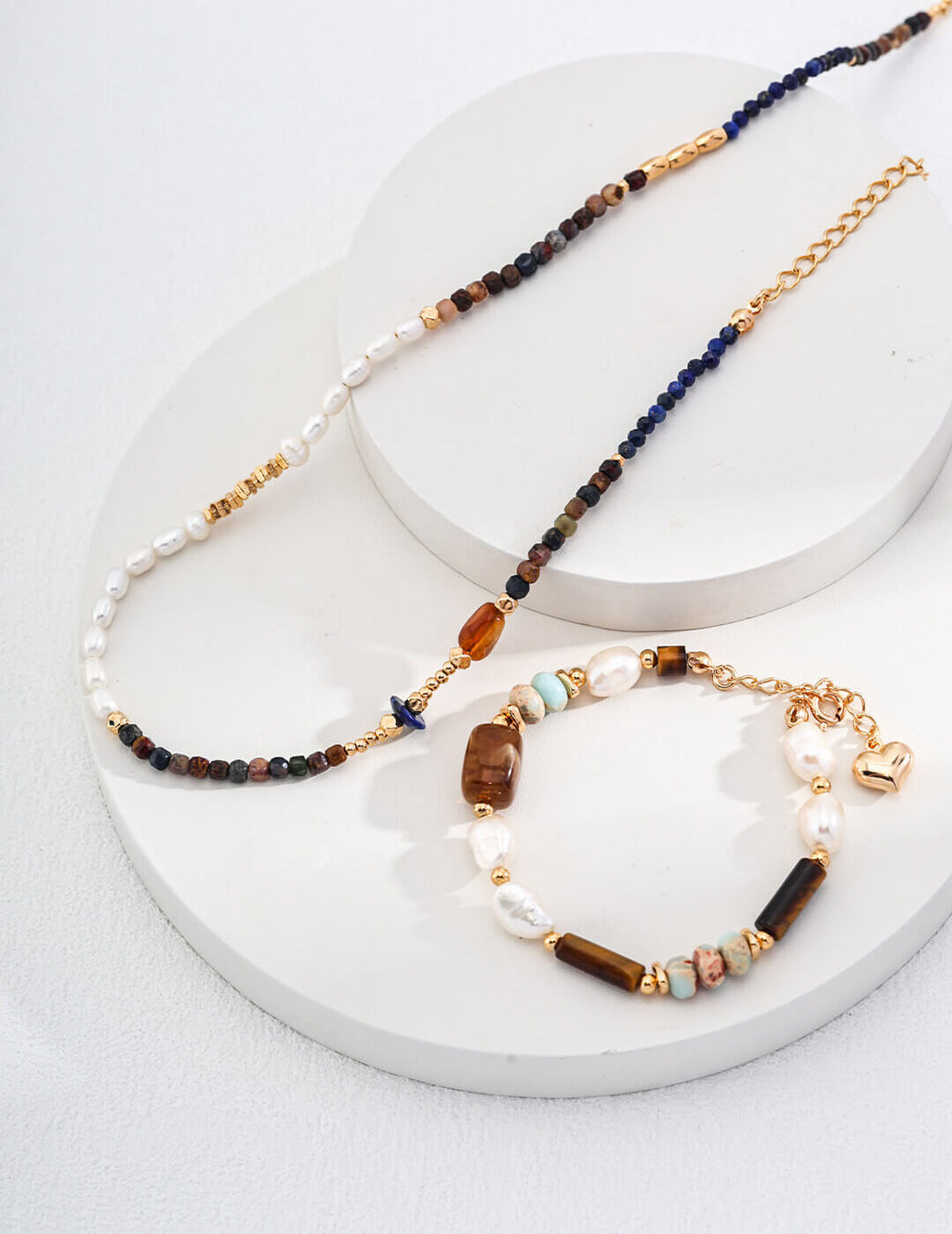 The bracelet stacked with other gold and crystal bracelets for layered look.