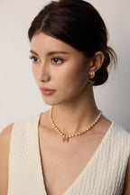 Tiger's Eye earrings adding artistic flair to creative professional or social settings.