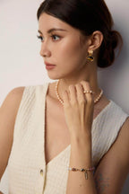 Warm Tiger's Eye earrings complementing daytime casual style with natural gemstone beauty.