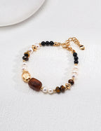 Bracelet with beads on a white surface