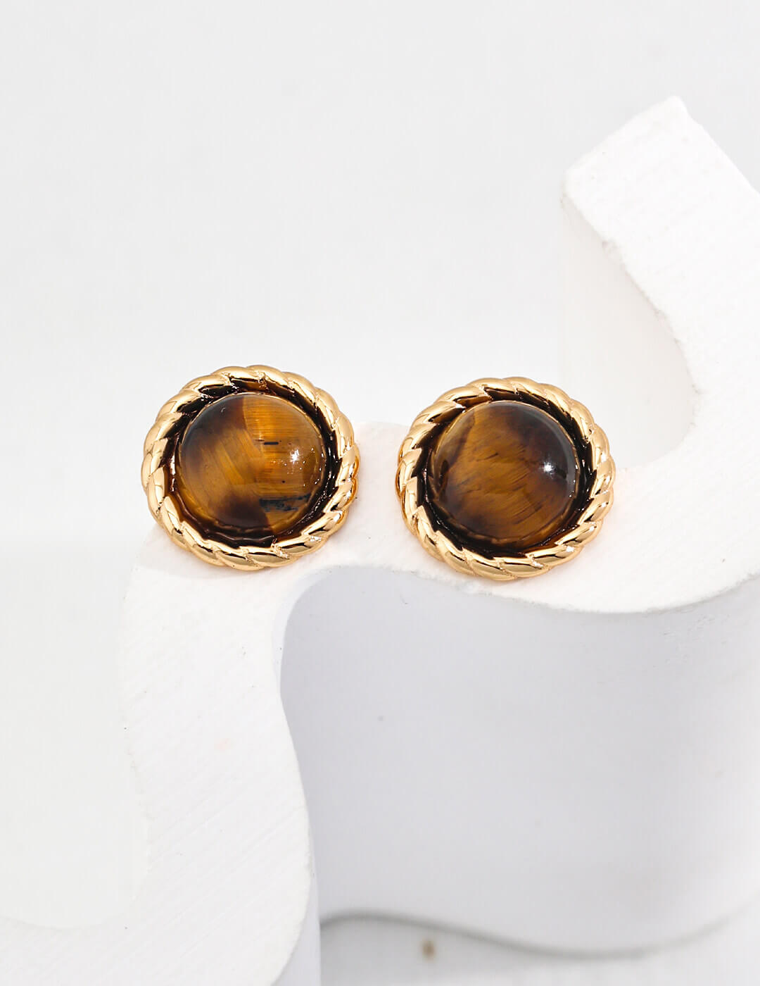 Front view of Tiger's Eye stud earrings in vintage gold S925 silver.