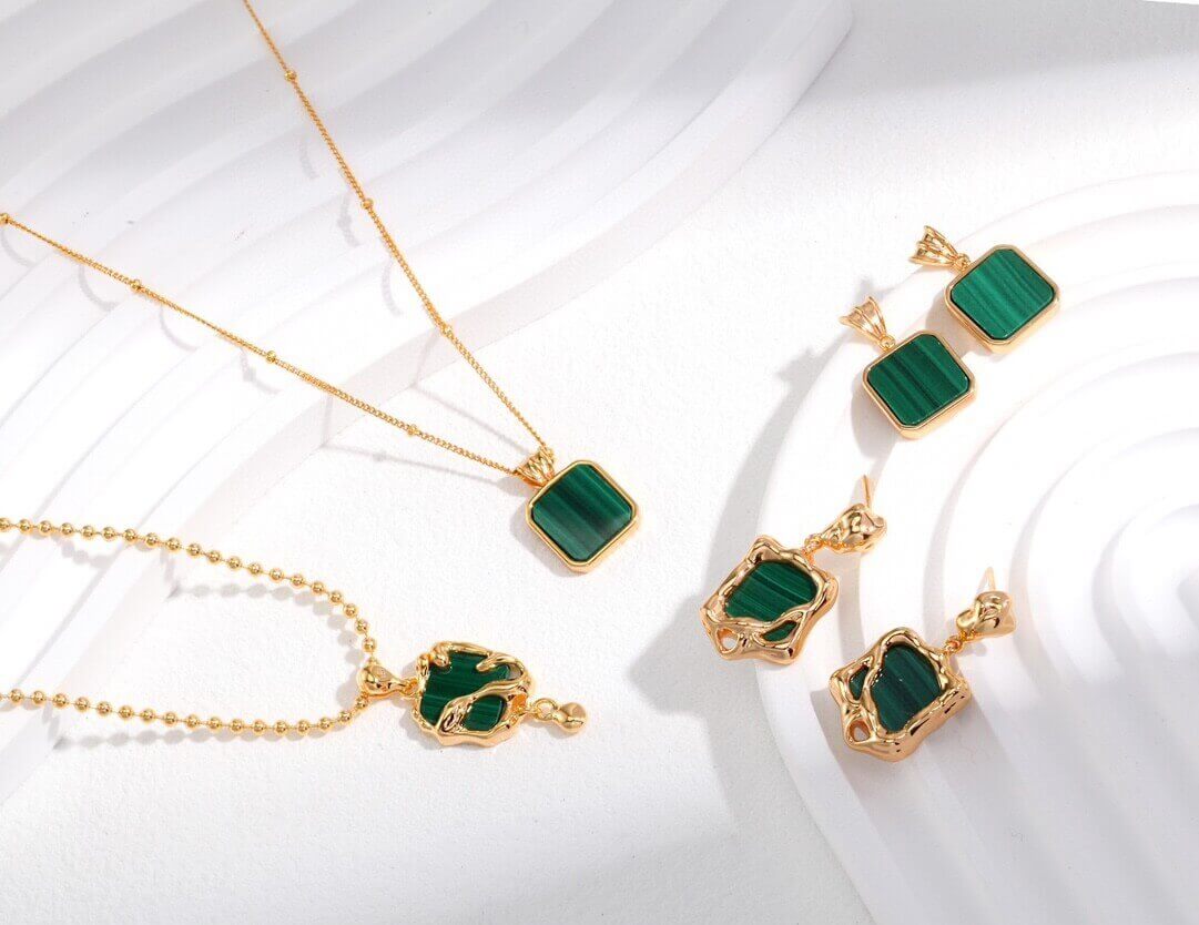 Vintage color palette of the malachite and sterling silver earrings, embodying a timeless pursuit of beauty.