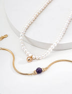 Close-up of the vintage gold lobster clasp and extender chain.