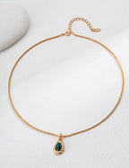 Front view of the vintage gold malachite pendant necklace.