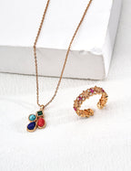 The necklace beautifully draped on a velvet surface to highlight its elegance.