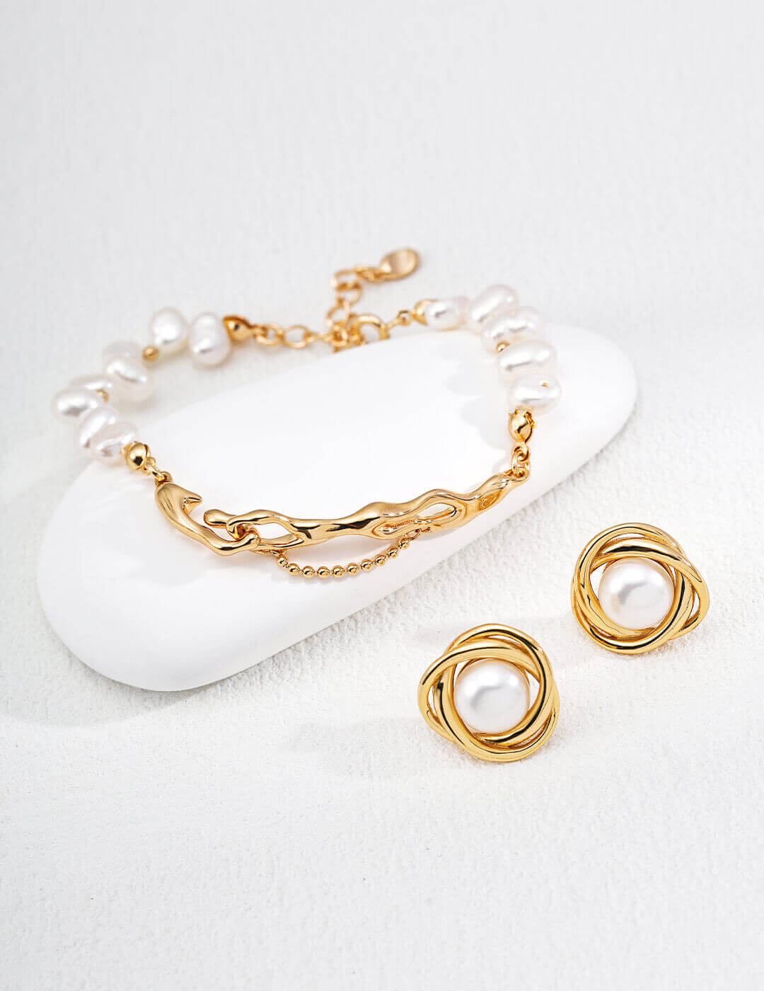 Side angle view of vintage pearl bracelet highlighting pearl placement.