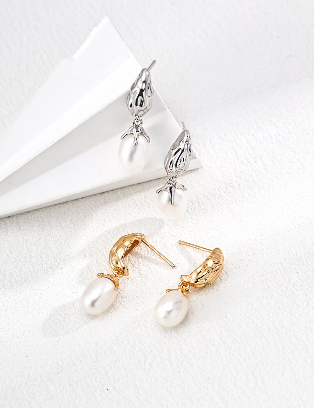 Front view of vintage natural pearl drop earrings in S925 silver