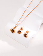 Complete Vintage Natural Tiger Eye jewelry set featuring necklace and earrings in 925 sterling silver with warm gold finish.