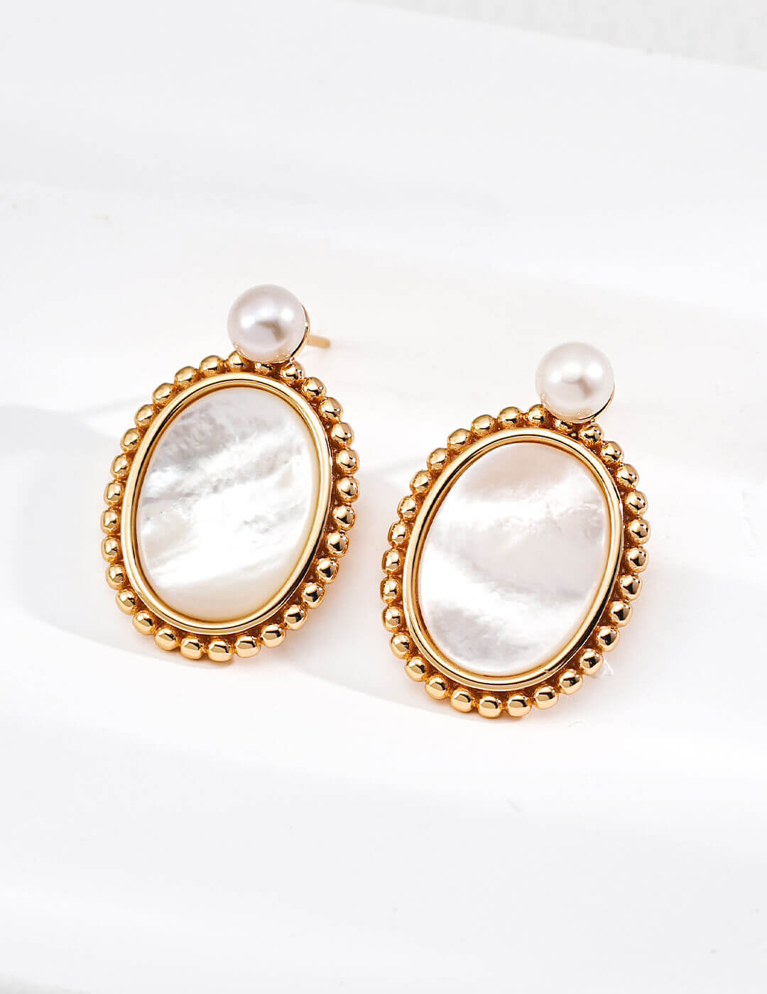 Detailed shot of the vintage-inspired sterling silver beaded border, reflecting romantic era artistry.